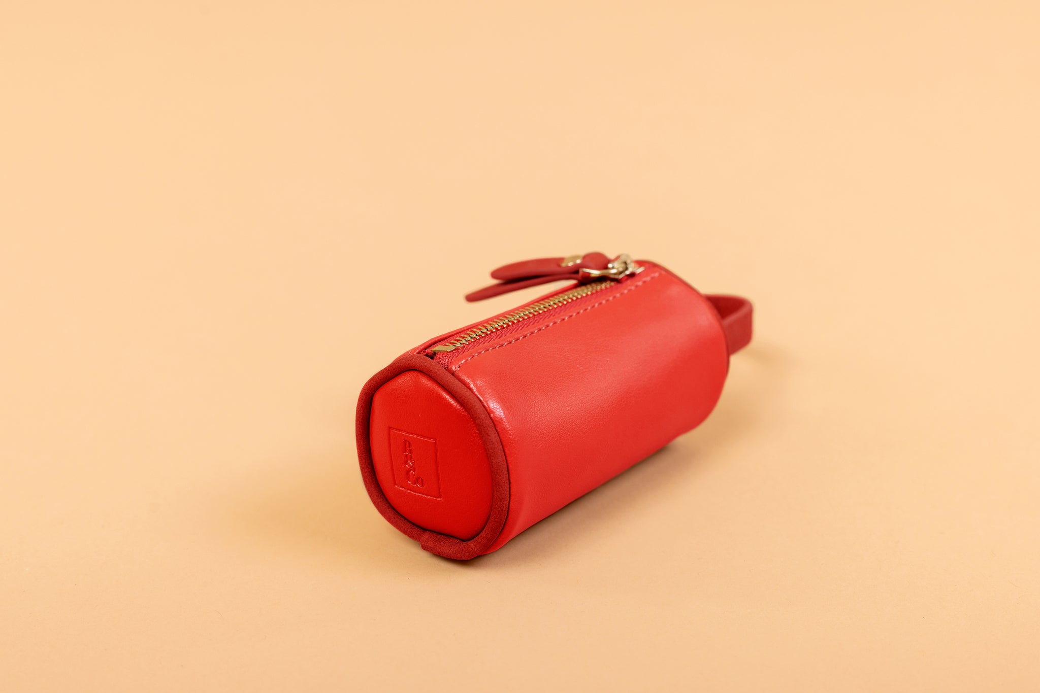 Apple Leather Poop Bag in Festive Red